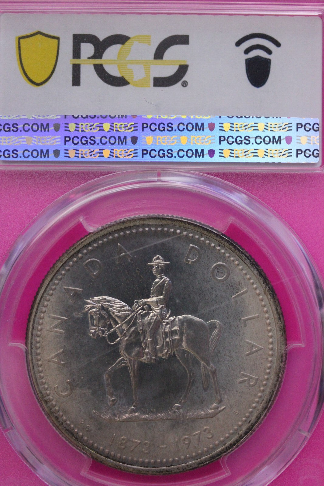Rainbow Toned 1973 SP 65 Canada RC Mounted Police Silver Dollar PCGS Graded 741