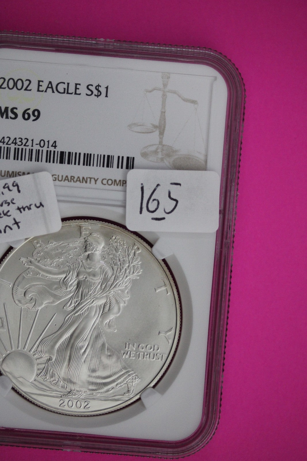 Obverse Struck Thru 2002 MS 69 Silver Eagle 1 OZ .999 Silver NGC Graded 165