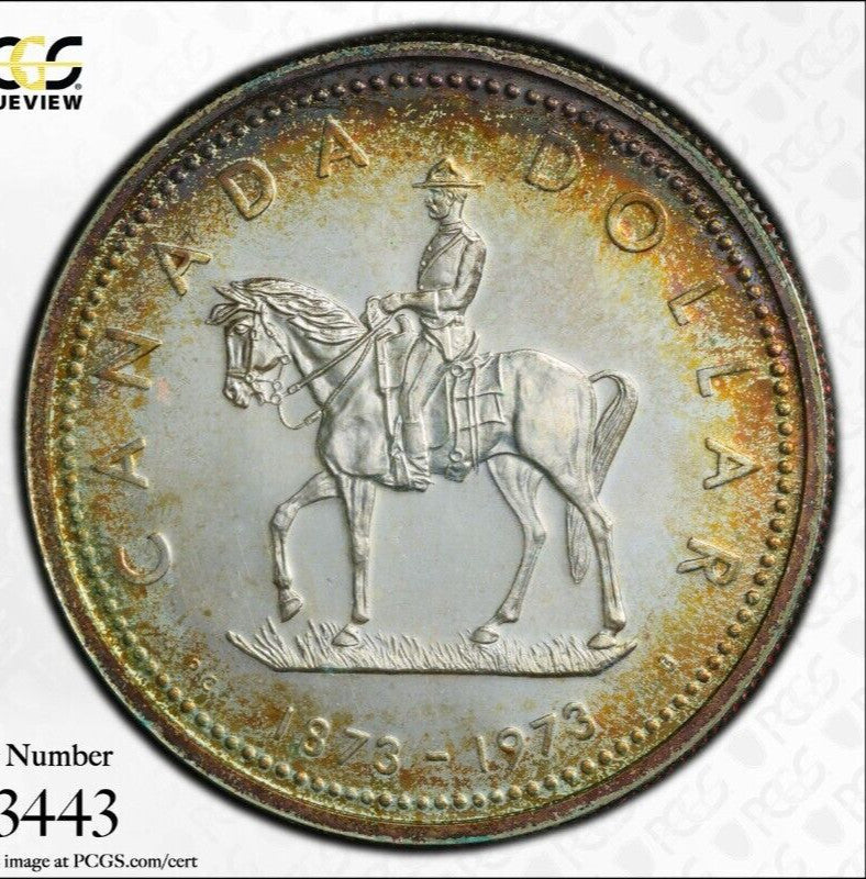 Golden Toned 1973 SP 65 Canada RC Mounted Police Silver Dollar PCGS Graded 739